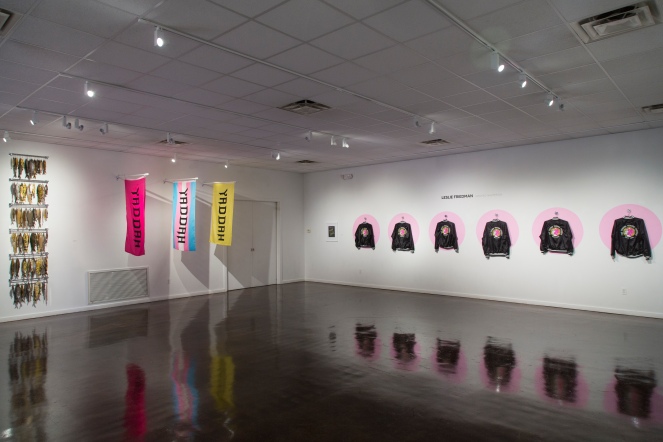 Smoked Whitefish, room dimensions 17’ x 35’ x 10’, mixed media: screenprints on fabric, screenrpints on cast acrylic, screenprint with foil, embroidered jackets, embroidered patches, and metal, 2018.
